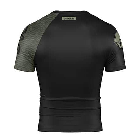 Black athletic shirt with green accents on a white background