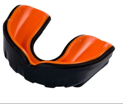 Two mouthguards, one blue and white, one orange and black, on a white background.